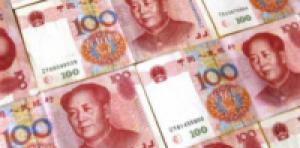 Народный банк Китая повысил курс юаня к доллару на 0,3%